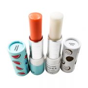 Custom lip balm containers with paper outer tube and plastic twist-up design – Eco-friendly lip balm packaging featuring a paper tube with vibrant watermelon and coconut designs.