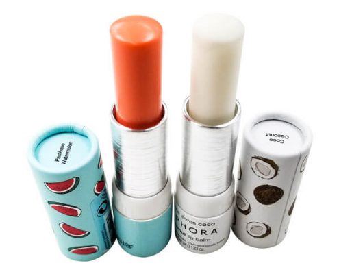 Custom lip balm containers with paper outer tube and plastic twist-up design – Eco-friendly lip balm packaging featuring a paper tube with vibrant watermelon and coconut designs.