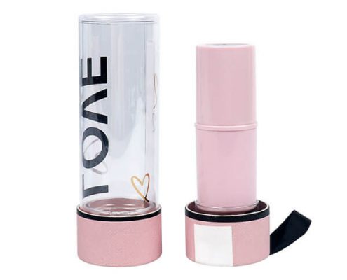 Customizable plastic lip balm containers with ribbon handle and secure lid.