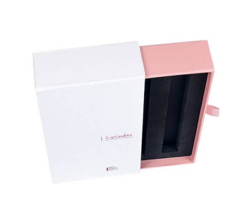 Drawer-style essential oil packaging box with a smooth ribbon handle for easy access.