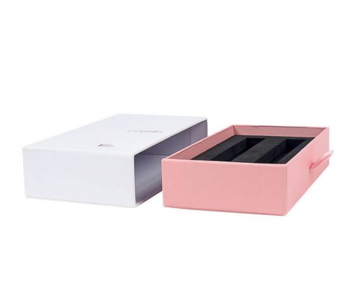 Rigid essential oil packaging box with custom foam insert for essential oil bottles.