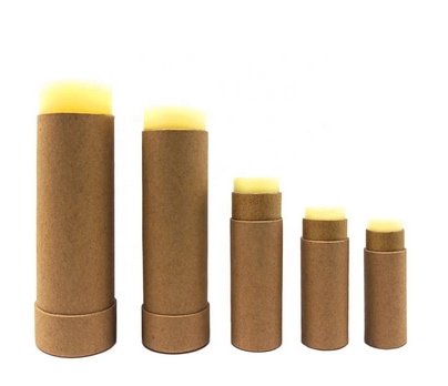 Biodegradable push-up lip balm tubes with vibrant red balm for eco-friendly cosmetics