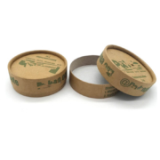 Plastic-free kraft paper cream jars with a minimalist design, suitable for storing balms and ointments.