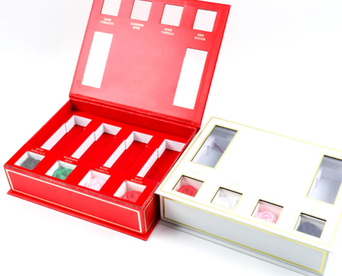 High-end perfume sampler set packaging with magnetic closure and EVA foam inserts for enhanced product protection.