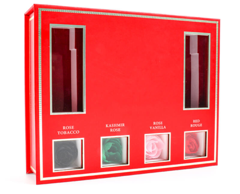 Luxury perfume sample packaging with vibrant colors and custom-cut foam inserts for securely holding sample vials.g