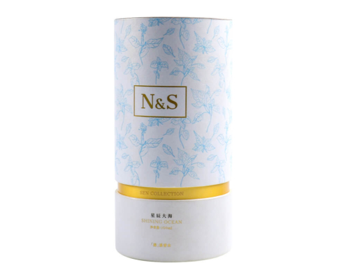 Elegant foundation packaging tube with floral pattern and gold accent design.