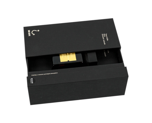 Sophisticated black reed diffuser box with a partially opened drawer, combining functionality and upscale design.