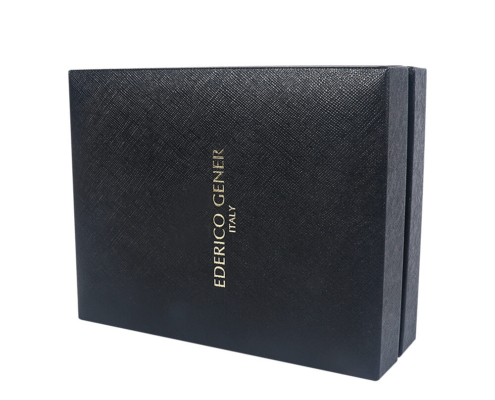 Detailed view of luxury perfume box with gold foil-stamped brand logo and premium rigid box design