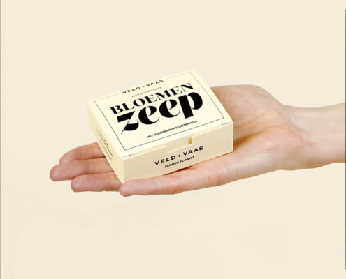 Compact soap box packaging held in hand, highlighting a sleek, minimalist design perfect for wholesale soap packaging.