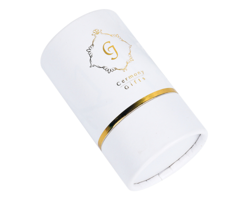 Angled view of white serum packaging with gold foil detail – A close-up, angled shot of the serum packaging box displaying the sophisticated gold foil detail, emphasizing its premium and minimalist aesthetic.