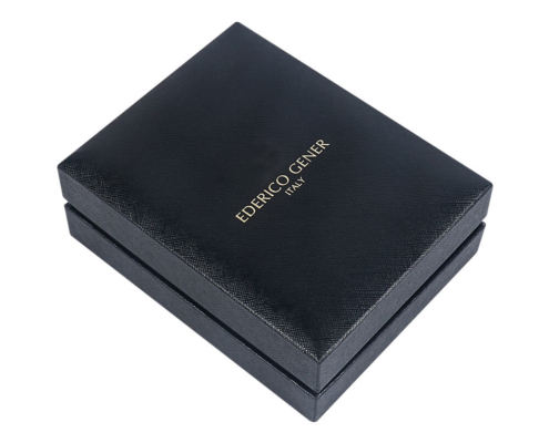 Top view of luxury perfume box with gold foil-stamped logo on leather-like surface