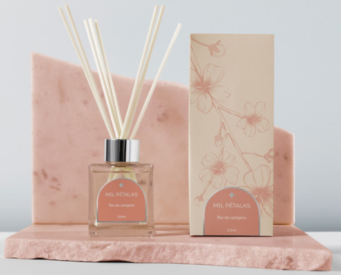 Cherry blossom reed diffuser with pink packaging and glass bottle