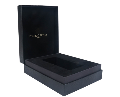 Black luxury perfume box with elegant gold foil-stamped brand logo on the inner lid