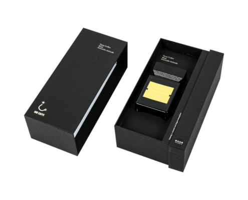 Open rigid drawer box reed diffuser packaging with gold detailing, featuring a secure EVA foam insert for luxury appeal.