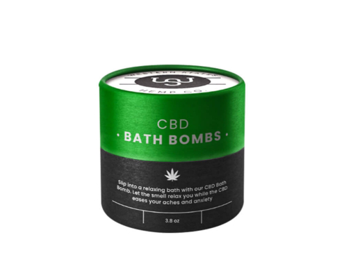 Eco-friendly CBD bath bomb packaging in a sleek green and black paper tube design.