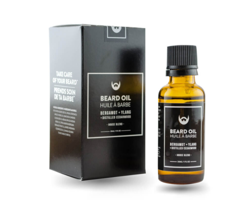 Premium beard oil packaging box in black, featuring "Beard Oil Huile à Barbe" with a brown glass dropper bottle placed beside it.