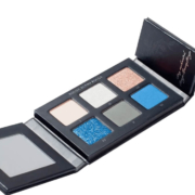 Black custom eyeshadow palette with built-in mirror for professional makeup application