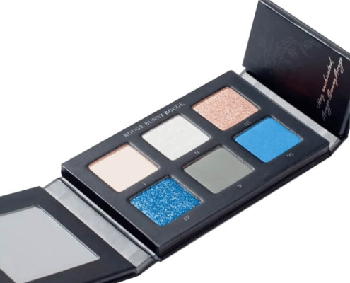 Black custom eyeshadow palette with built-in mirror for professional makeup application