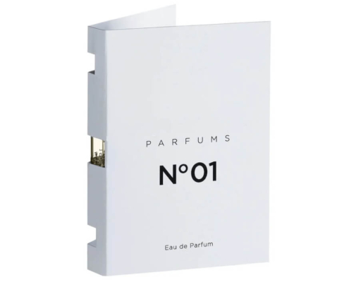 Luxury Perfume Sample Packaging: Close-up view of a luxury perfume sample box with embossing and debossing details.