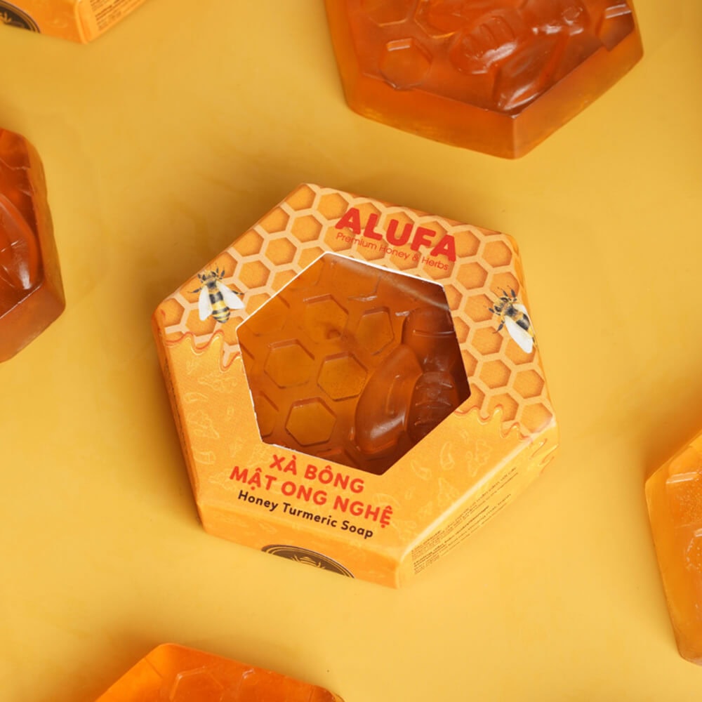 Honey turmeric soap in hexagonal cardboard packaging