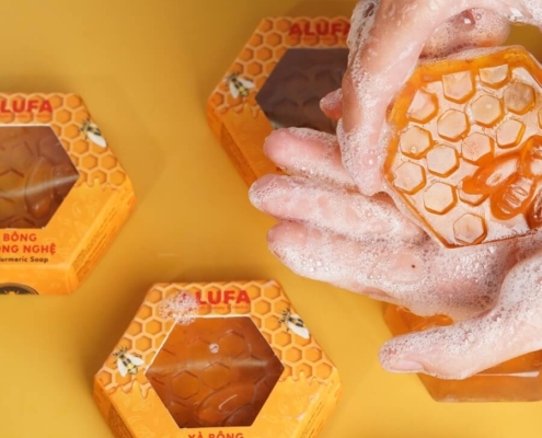 Close-up of hexagon soap boxes featuring an intricate honeycomb design.