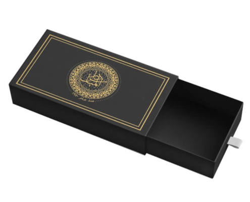 Black luxury box with pull-out design and gold accents – A sleek black drawer box featuring a central gold pattern and minimalist design, perfect for high-end products.