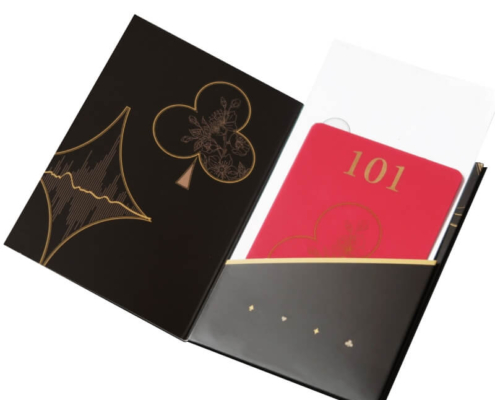 Custom card holder with key card insert in a red card – A partially opened black card holder with gold detailing, displaying a red room key card and inner compartments for organized storage.