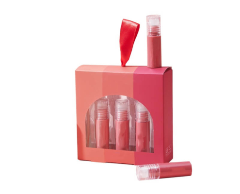 Lip gloss box set with red ribbon handle and a single lip gloss tube displayed separately