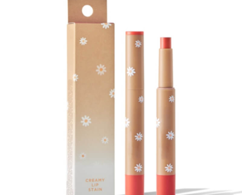 Beige lipstick box packaging with floral design, matching lipstick tube, and a hang hole, showcasing an elegant and eco-friendly design.