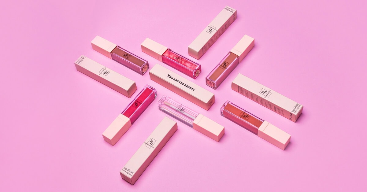 Custom lip gloss boxes with premium packaging design in pink, showcasing high-quality lip gloss packaging solutions from top vendors