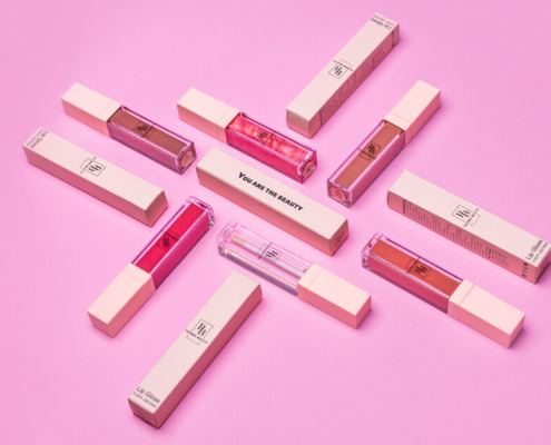 Custom lip gloss boxes with premium packaging design in pink, showcasing high-quality lip gloss packaging solutions from top vendors