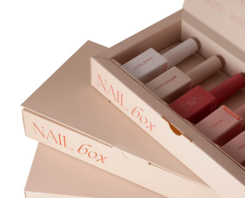 Custom nail boxes with protective inserts to securely hold and organize nail polish bottles.