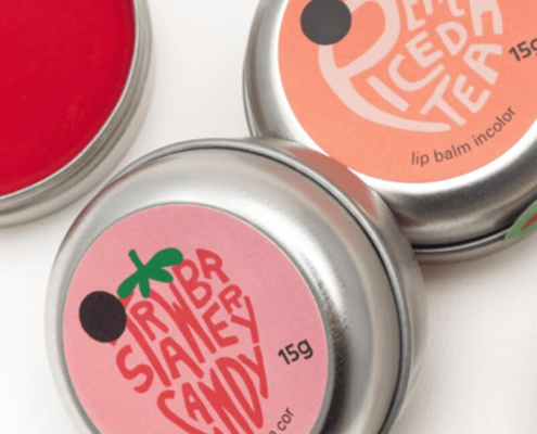 Multiple lip balm tins showcasing different angles and designs for branding