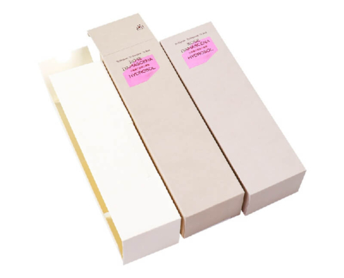 Custom textured paper packaging tailored for shampoo bottles and other cosmetics.