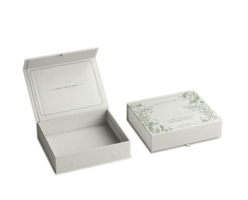 Open green rigid box with ribbon tab for luxury soap packaging and added convenience