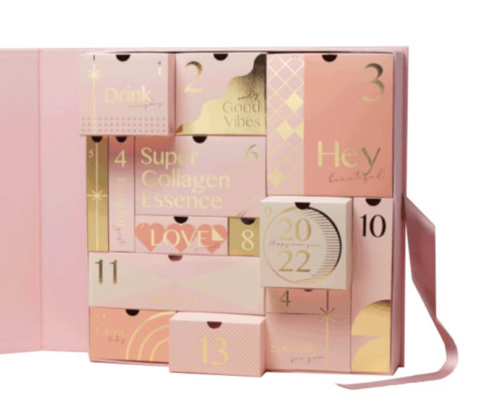 Elegant pink advent calendar packaging for personalized luxury gifts.