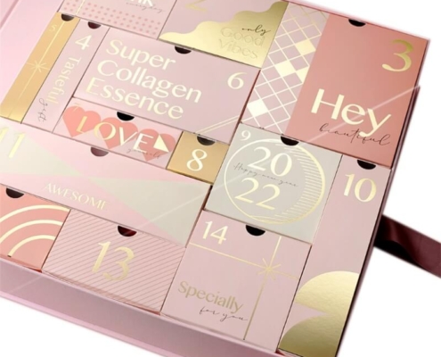 Luxury advent calendar box featuring folding carton inserts and magnetic closure.