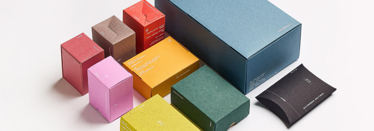 Premium collection of cardboard cosmetic packaging boxes in various colors and sizes for 2025.