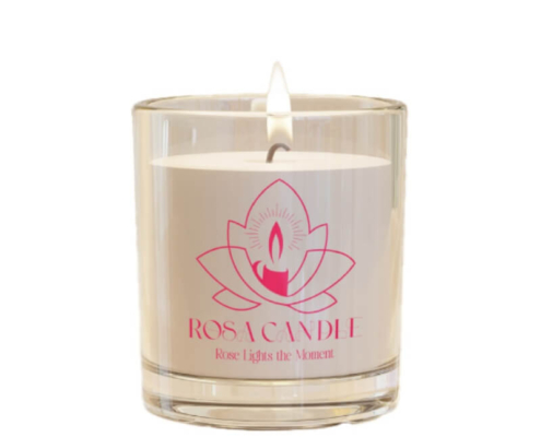 Rosa candle label with a lotus-inspired logo on a clear glass container for elegant branding.