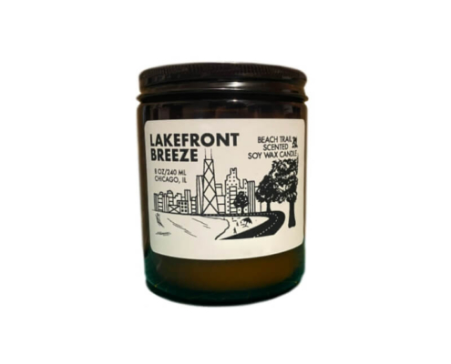 Lakefront Breeze candle label with a Chicago skyline illustration on a soy wax jar.