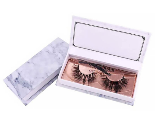 Luxury custom eyelash packaging with marble finish and rose gold insert for high-end lashes.