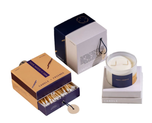 Luxury candle box set with distinct labels for each scent, neatly stacked in premium packaging for candles with a sophisticated finish.