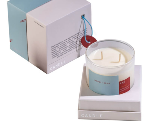 Luxury candle packaging set in minimalistic style with high-end finishing and unique color combinations, designed for premium soy candles.