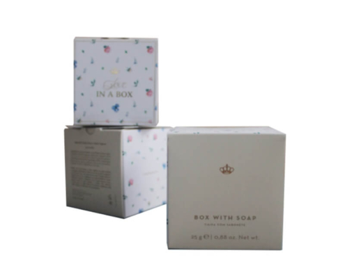 Soap boxes with floral prints, showcasing hot foil stamping and crisp CMYK printing for a luxurious appearance.