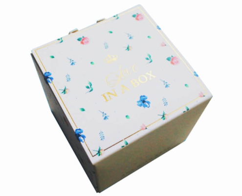 Custom soap box with floral design, featuring full-color CMYK printing and hot foil stamping for a premium finish.