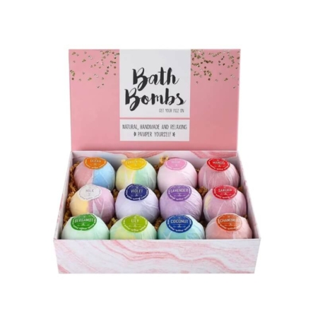 Bath bomb display boxes showcasing a variety of rainbow-colored bath bombs with labeled scents.