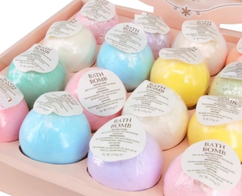 Luxury bath bomb display boxes featuring soft pastel bath bombs for a relaxing bath experience.