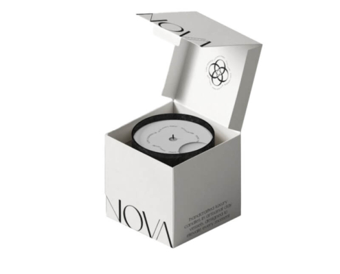 Elegant white and black candle dust covers with a lid and minimalistic logo, perfect for high-end candle packaging.