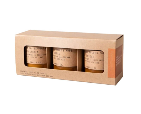 Stacked kraft candle boxes with inserts showing clear custom windows and inserts, a great example of functional and stylish folding cartons packaging.