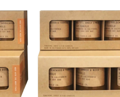 Lifestyle shot of various candle jars and kraft candle boxes with inserts, designed using sustainable folding cartons packaging ideal for branding.